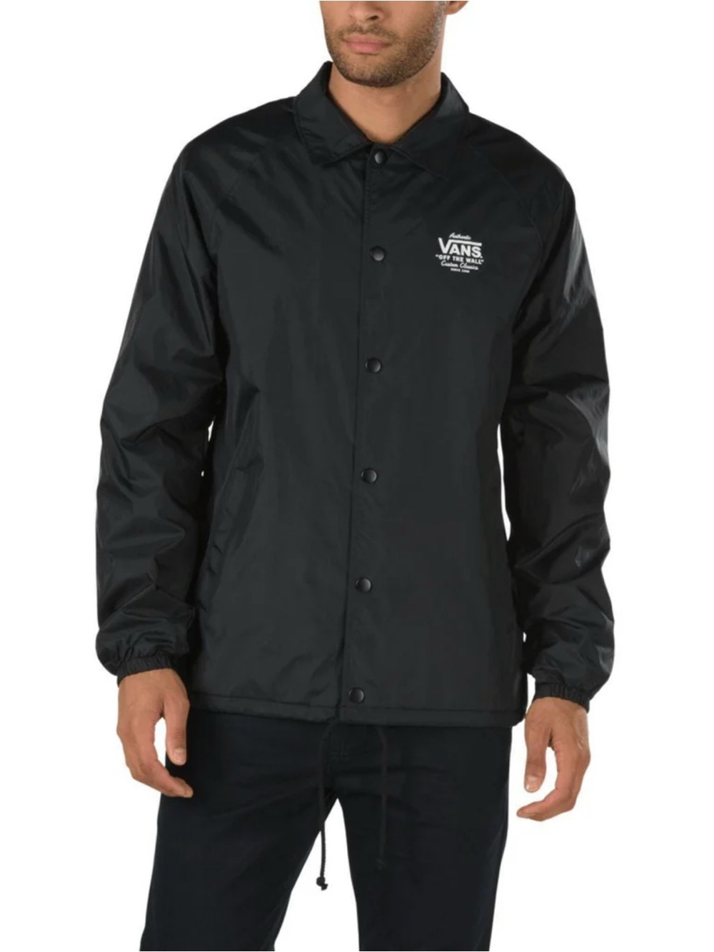 Vans Torrey Coaches Jacket in Black featuring snap front and logo patch on front